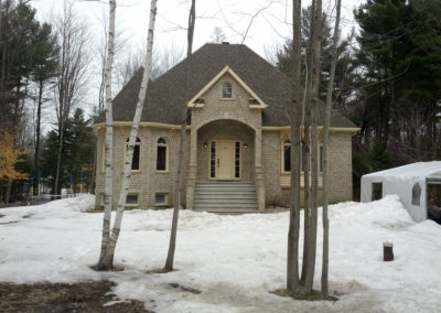 Gouttière en aluminium sans joint en PVC d'une maison à Repentigny - Gouttière Rive-Nord